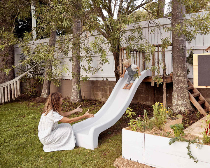 adventure play with slides or raised platforms for kids