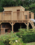 A cypress and pine timber raised cubby house with slide