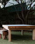 A beautiful hardwood timber outdoor washable art and craft table