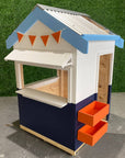 A navy, white, and blue painted wooden cubby house for schools and education