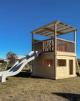 Timber Raised Platform Cubby House with Slide - For Primary Schools & Early Learning Centres - Hand Built in Australia by Castle & Cubby.