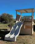 Timber Raised Platform Cubby House with Slide - For Primary Schools & Early Learning Centres - Hand Built in Australia by Castle & Cubby.