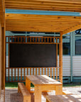 Timber pergola with a large blackboard for an outdoor classroom