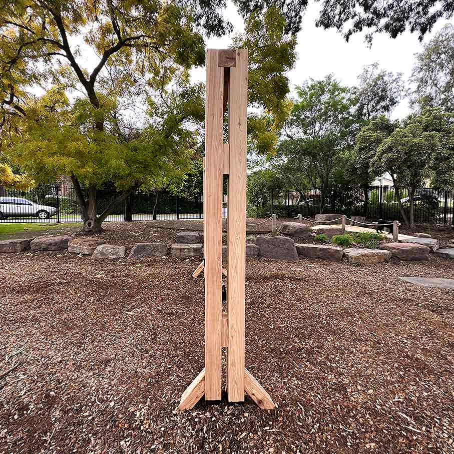 Side profile of timber swing set. Hand made in Australia for Childcare centres and primary schools.