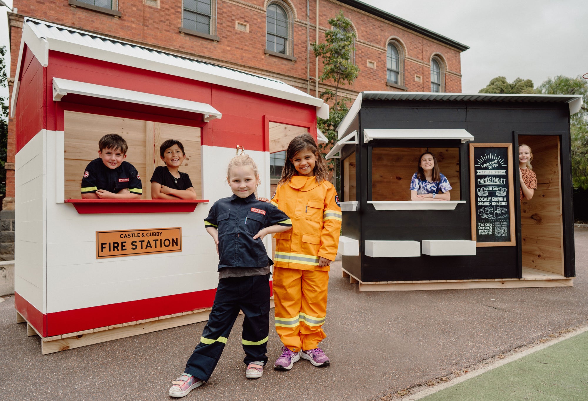 Imagination play with themed cubby houses, fire station and farmer's market