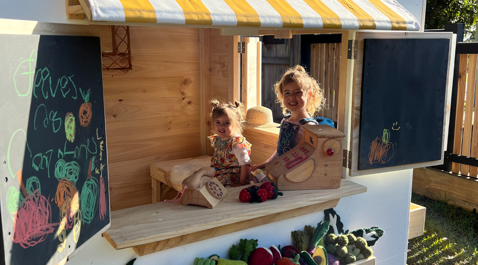 A Wooden Cubby House - A gift from the Grandparents to 2 special little girls. 