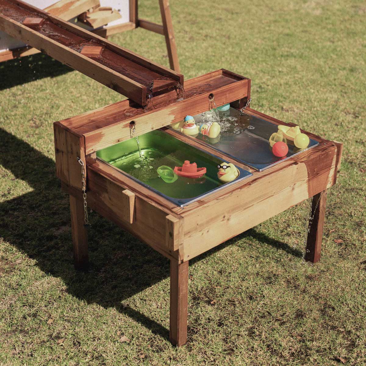 Kids Timber Outdoor Water Wall. Designed for teaching kids about cause and effect, motion, maths and other play-based learning skills, while having a bit of fun at the same time.