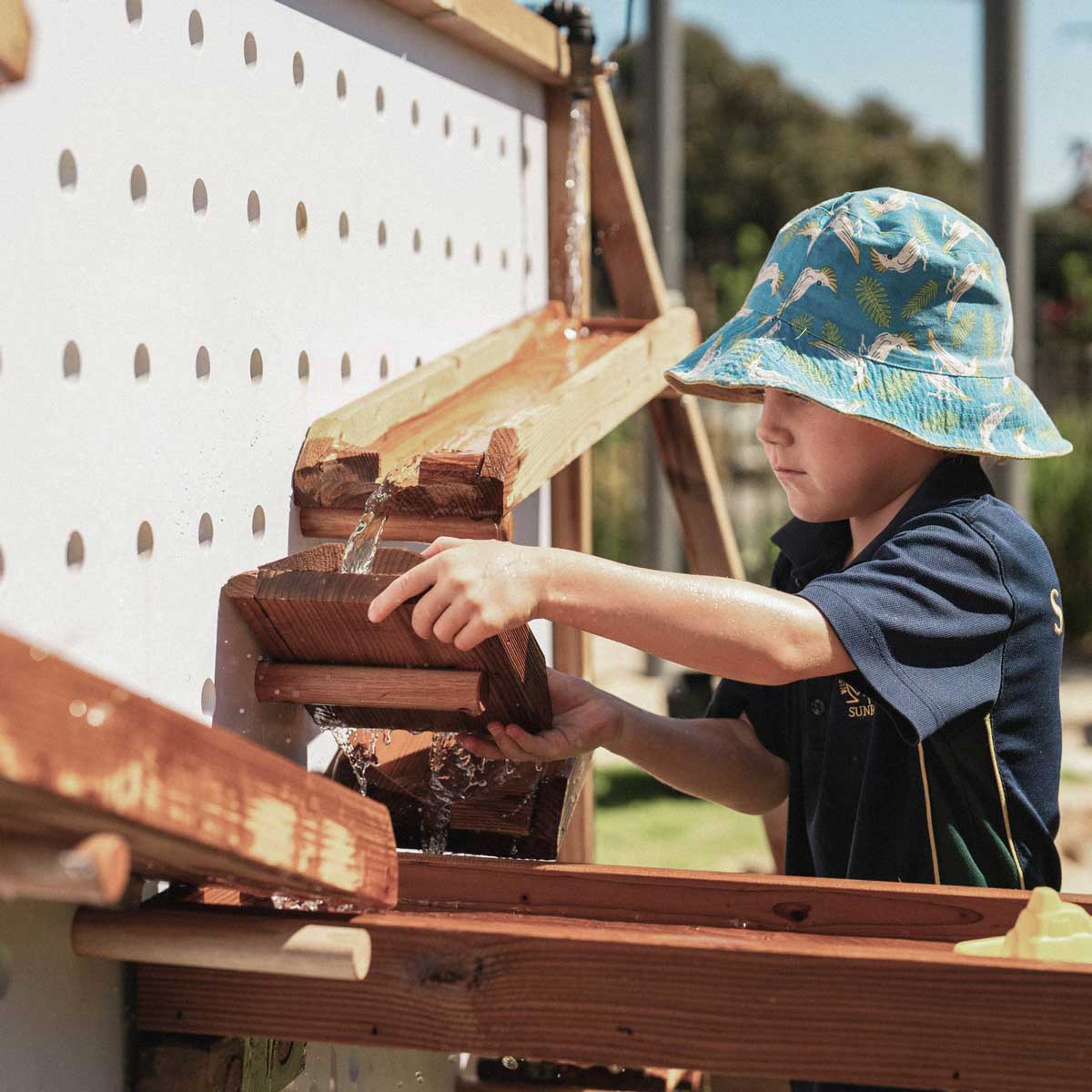 Kids Timber Outdoor Water Wall. Designed for teaching kids about cause and effect, motion, maths and other play-based learning skills, while having a bit of fun at the same time.