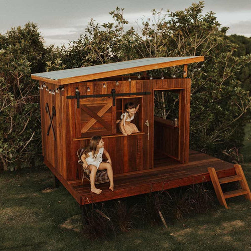 Premium Wooden Cubby House designed for Temple Farmhouse Airbnb. Made in Australia by Castle & Cubby. 